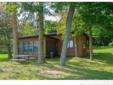 $675,000
Big Pine Lake acreage and 469' of hard sand frontage! Main home Two BR/Two BA/